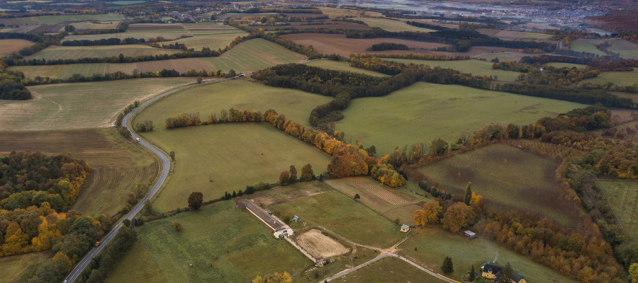 Land Valuation: Assessing the Location-Specific Influence of Soils, Natural Resources, and Renewables